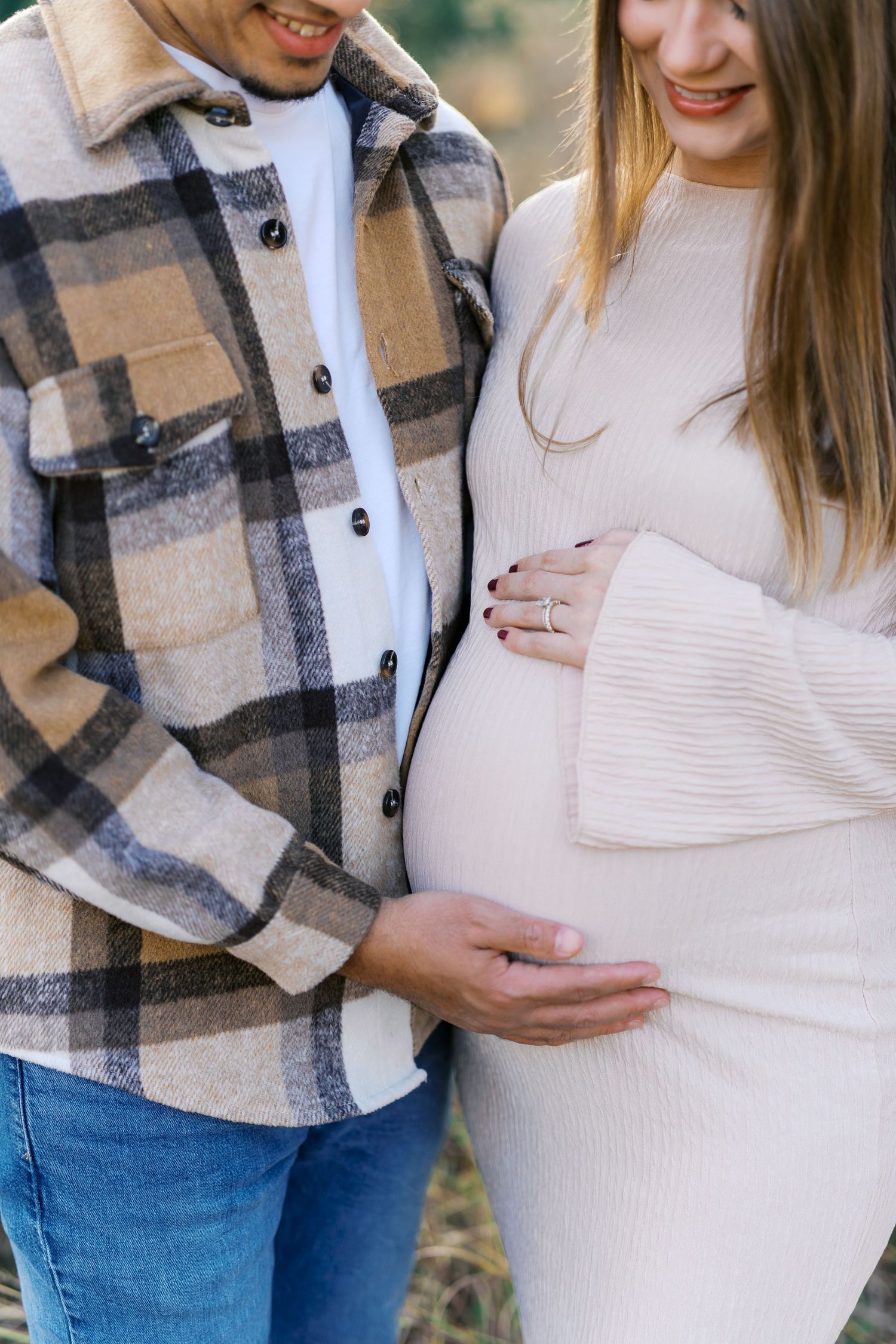 Close-up shots of a couple in casual attire with plaid shirt and cream sweater.