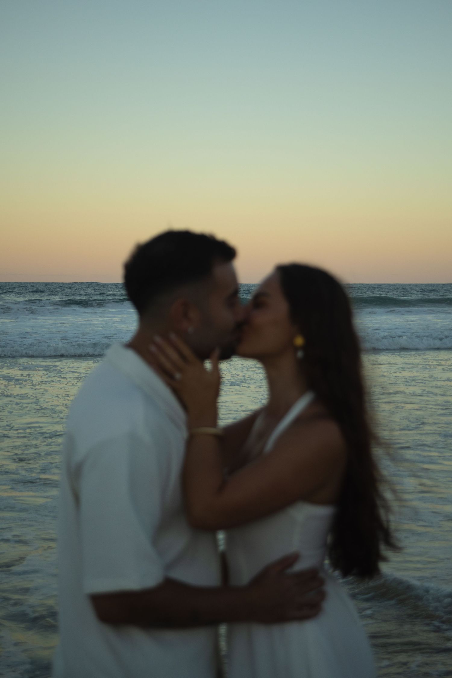 Sunset engagement photos at Wurtulla Beach Sunshine Coast
