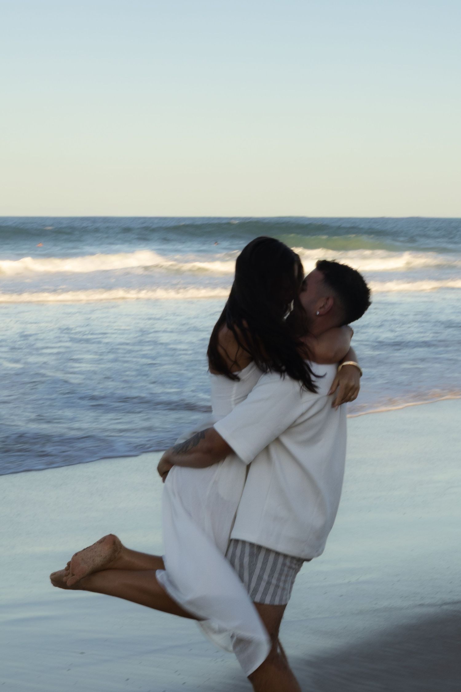 Sunset engagement photos at Wurtulla Beach Sunshine Coast