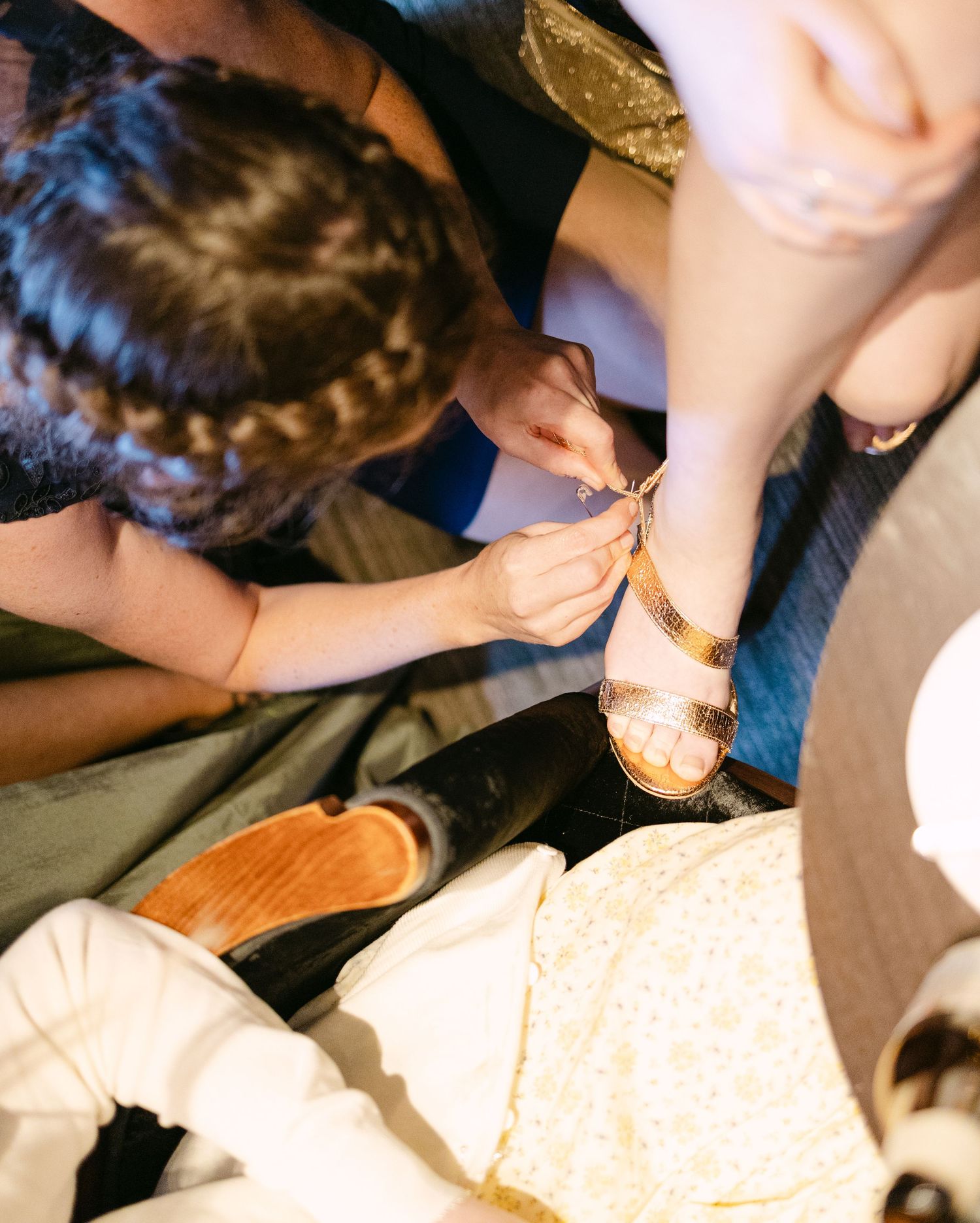 Close-up details being written in a wedding guest book.