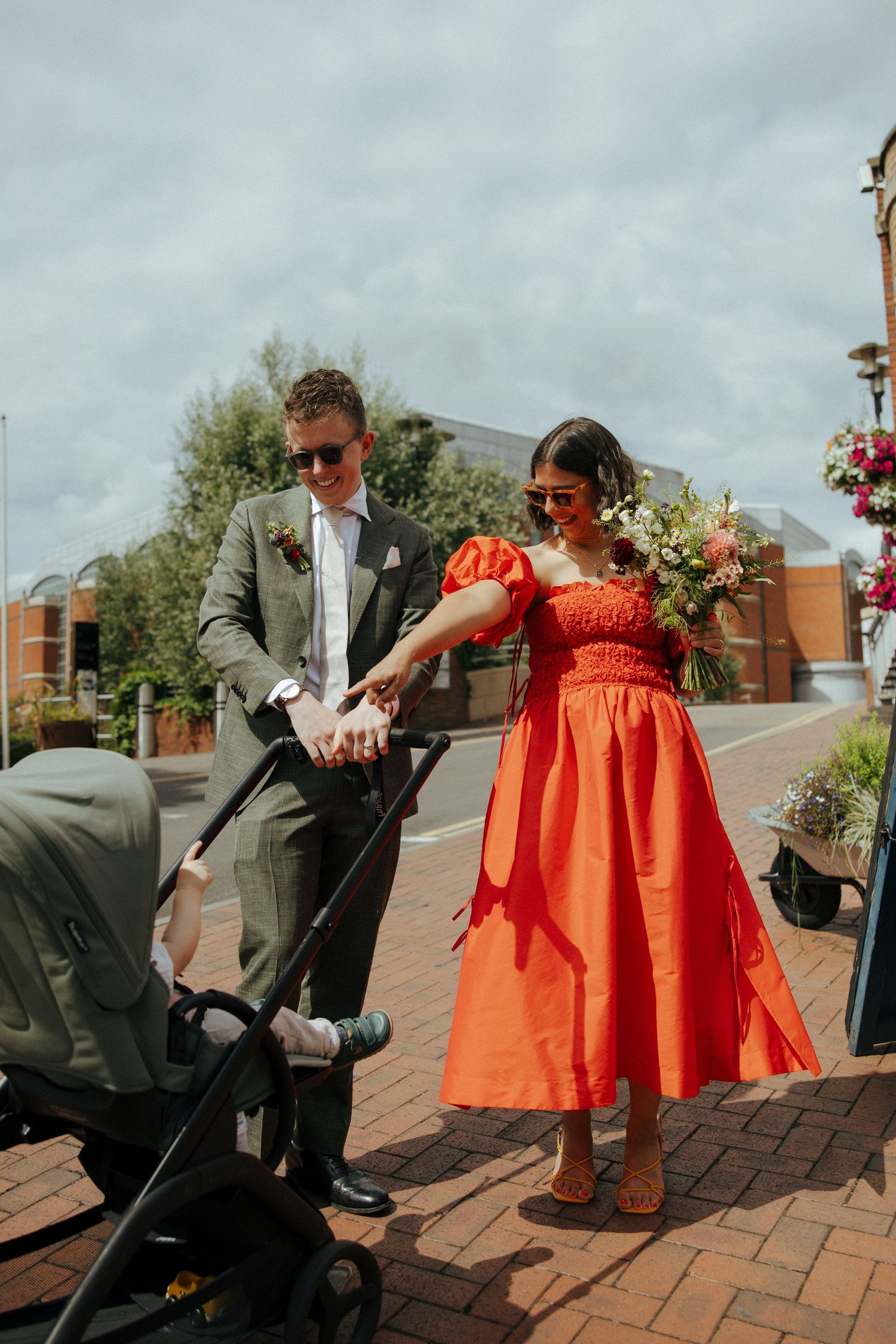 Family portraits outside Reading Town Hall after a registry wedding