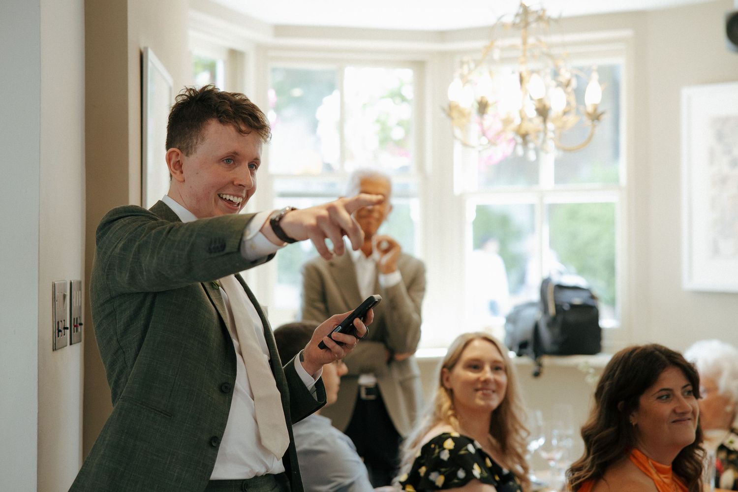 Couple toasting with champagne glasses during their intimate wedding reception in Reading