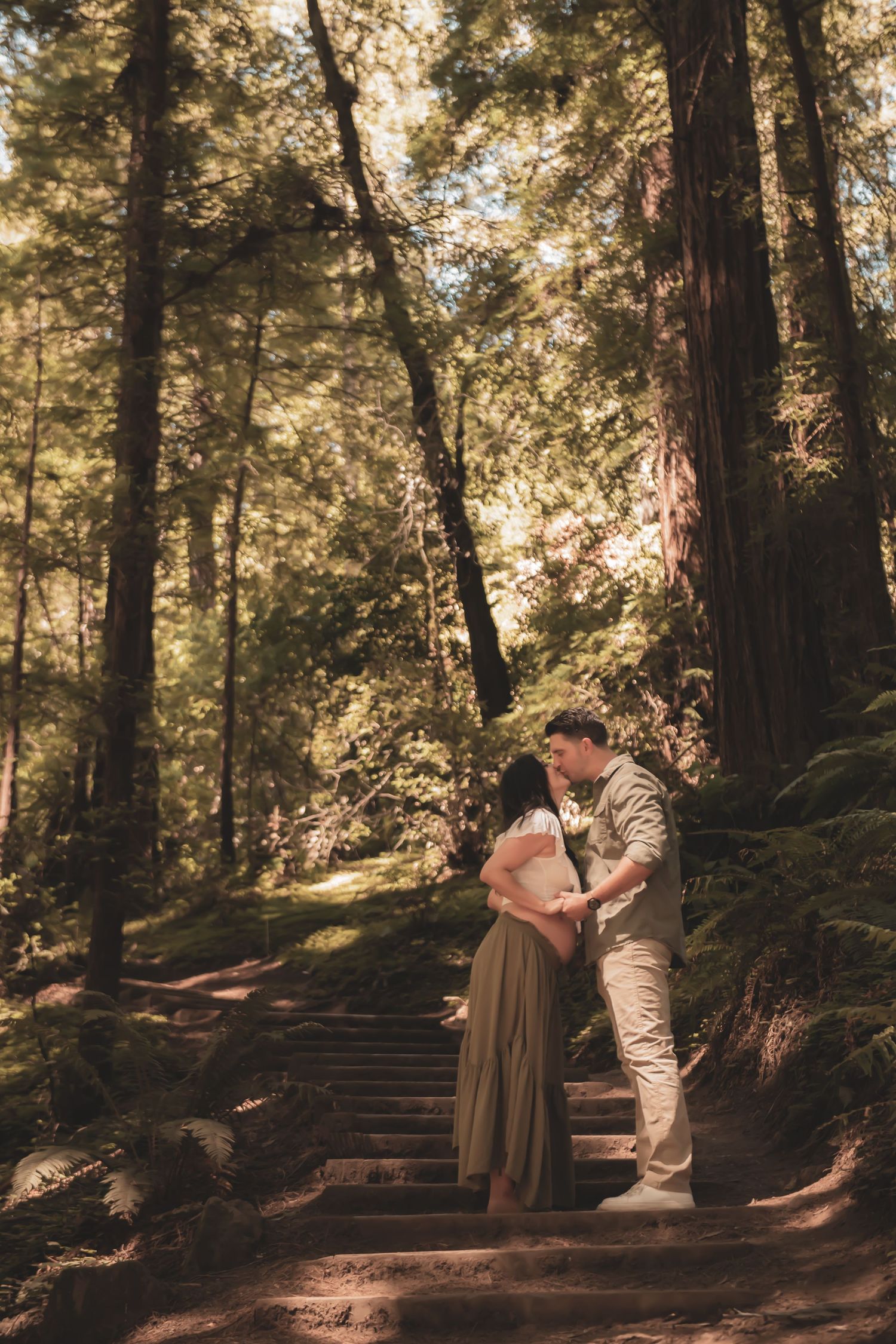 A romantic scene on wooden forest steps surrounded by tall trees and dappled sunlight in a dreamy, warm atmosphere.