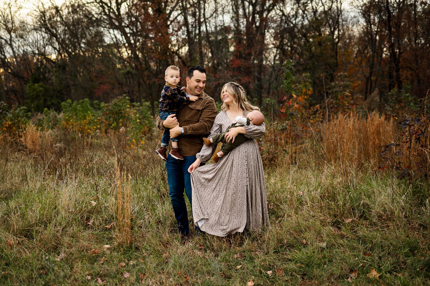 Outdoor family photography session with parents and young children photographed by Raleigh family photographer