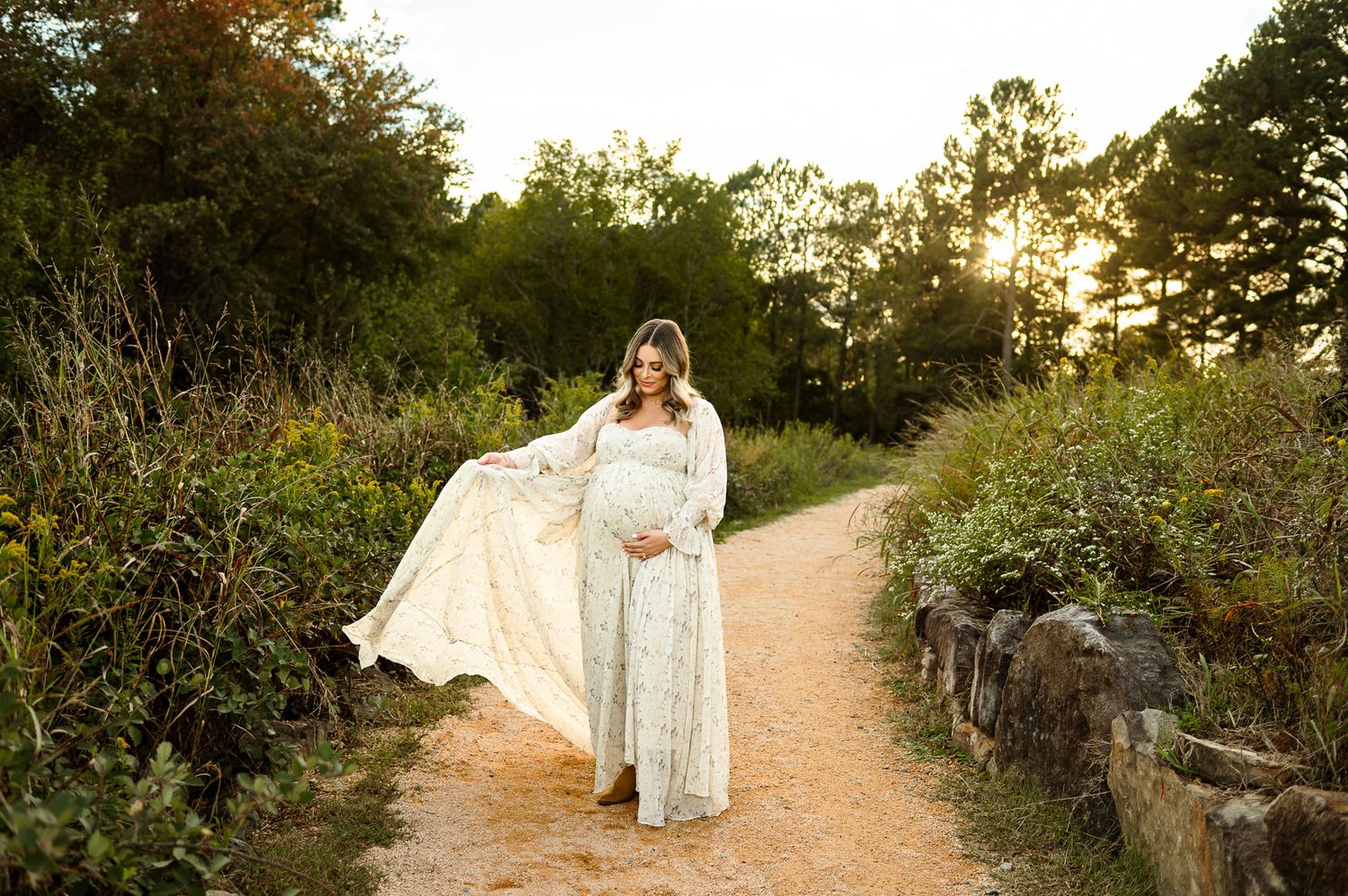 Expectant mother photographed during an outdoor golden hour maternity session in Raleigh NC