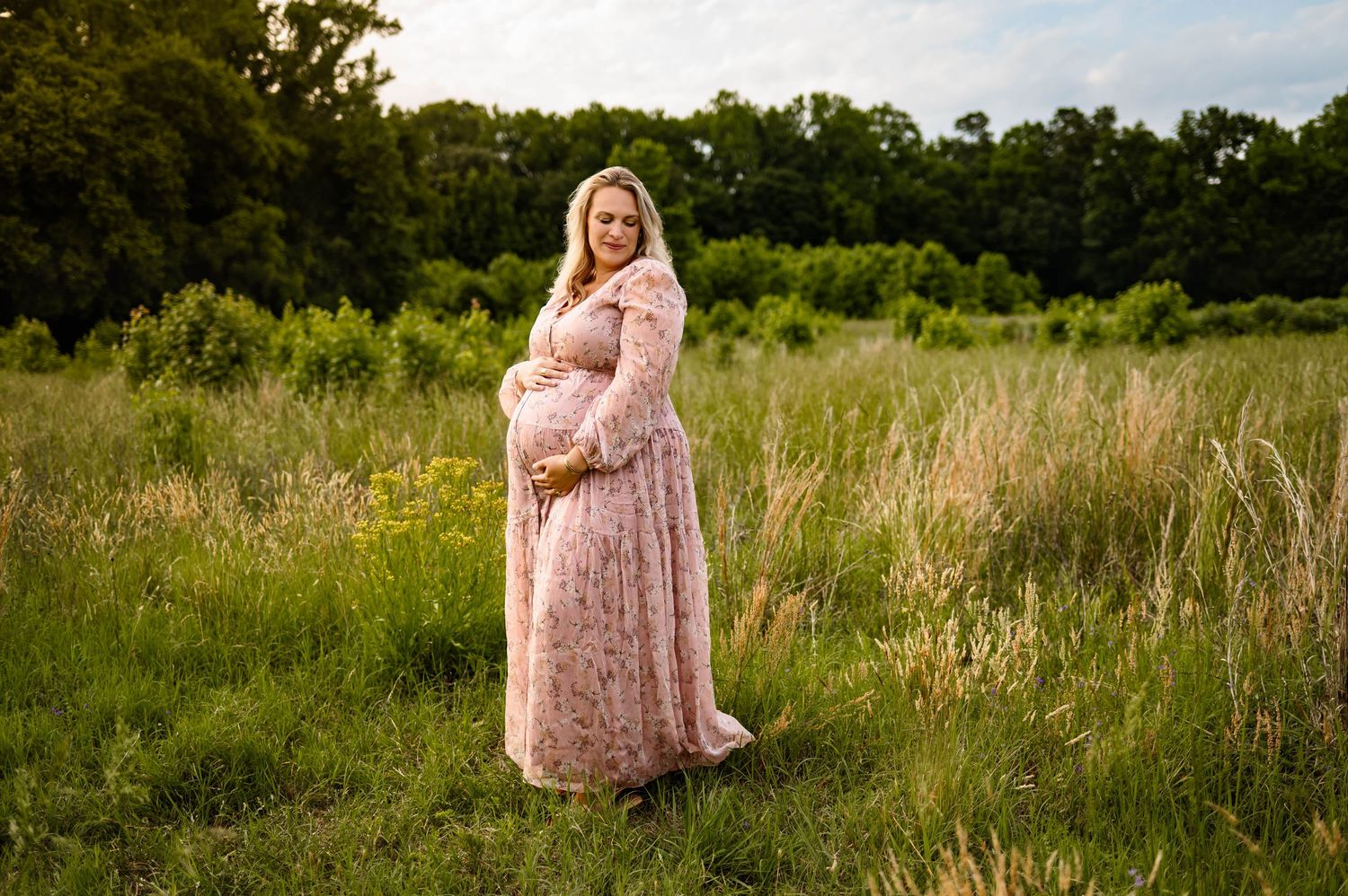 Raleigh maternity photographer Emma Branch captures an expecting mother during a summer photo session