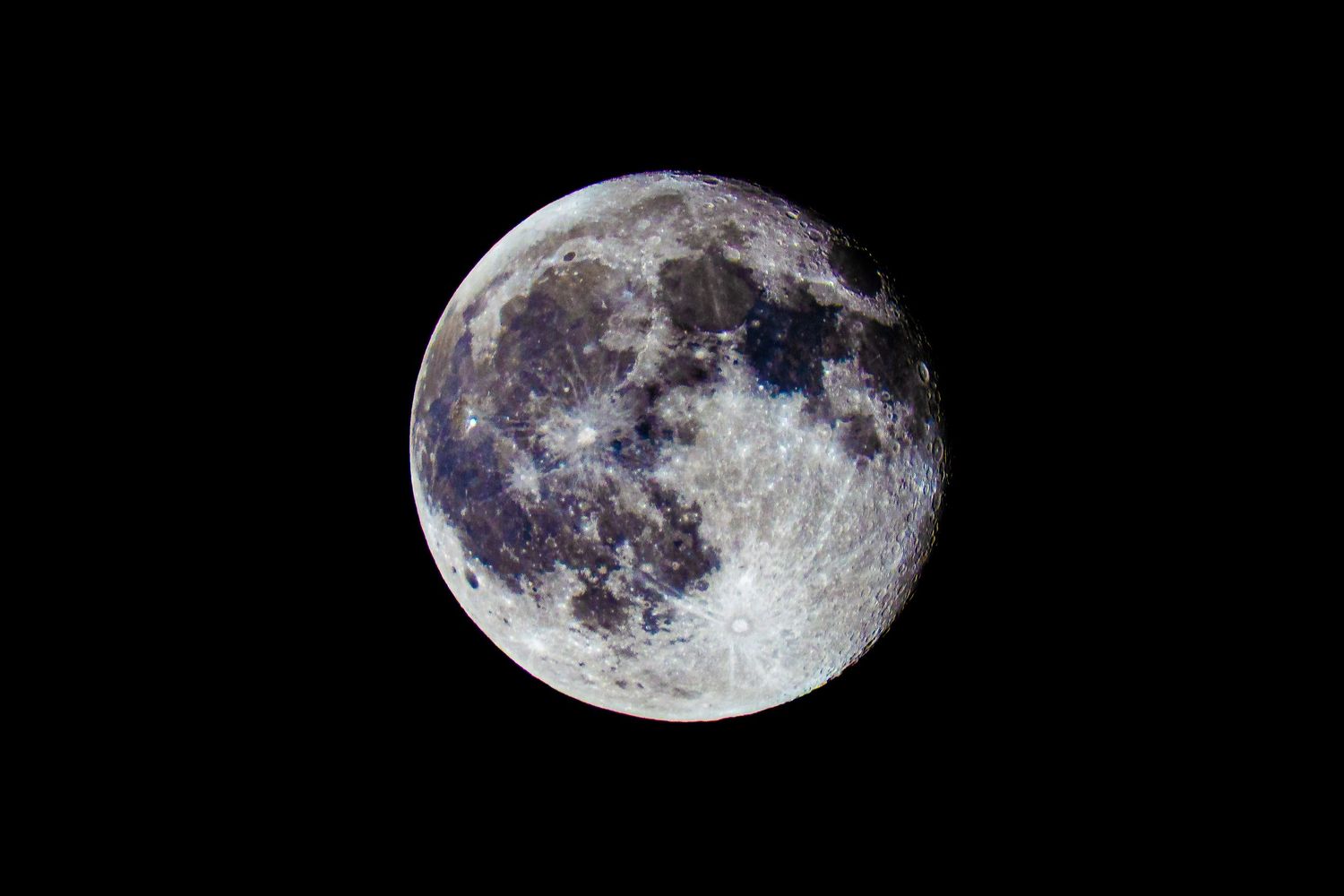 A sequence of six photographs showing different phases of the moon from crescent to full moon during its lunar cycle.