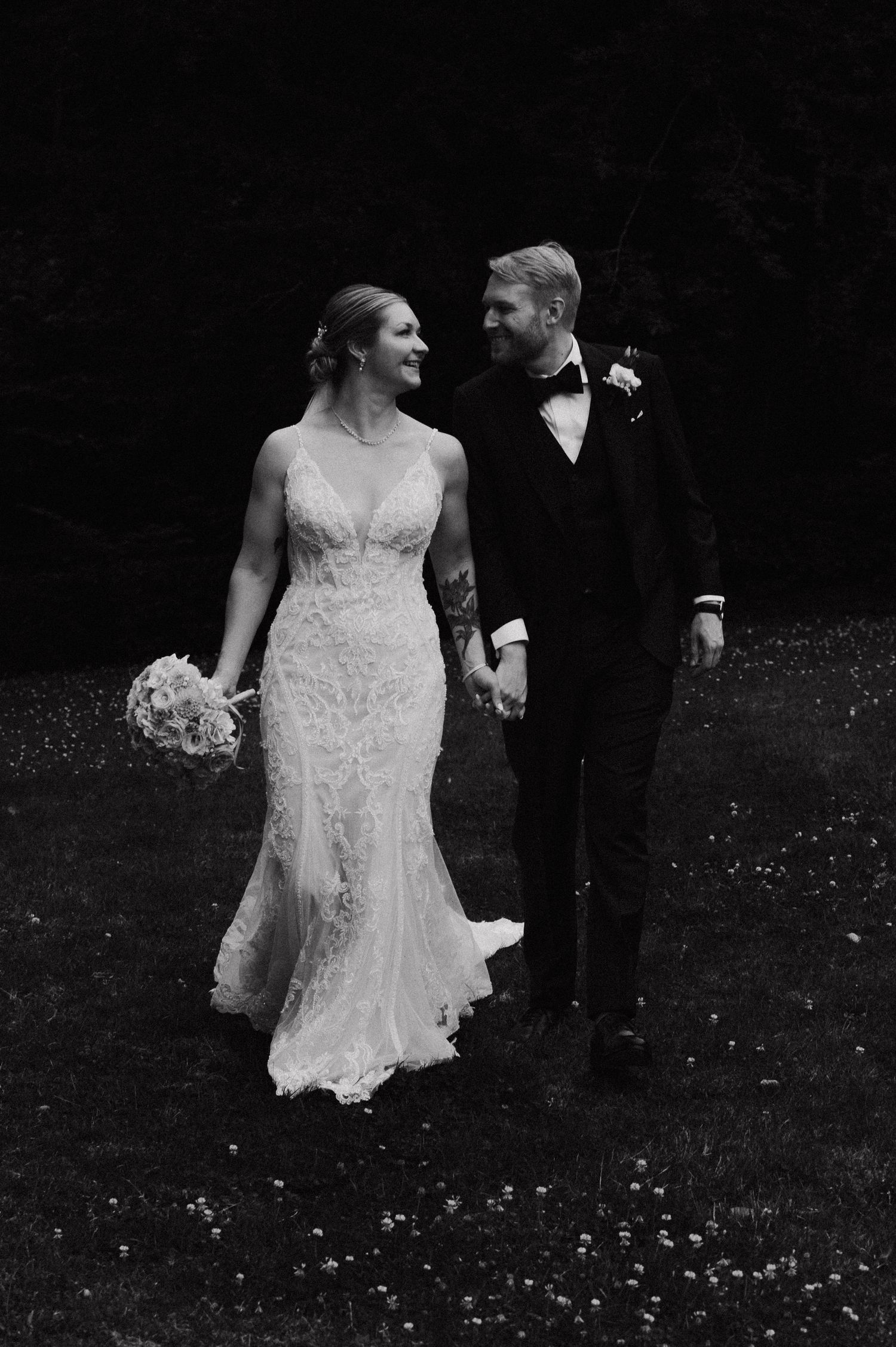 Black and white wedding photo series showing a couple walking together outdoors in formal attire with a bridal bouquet.