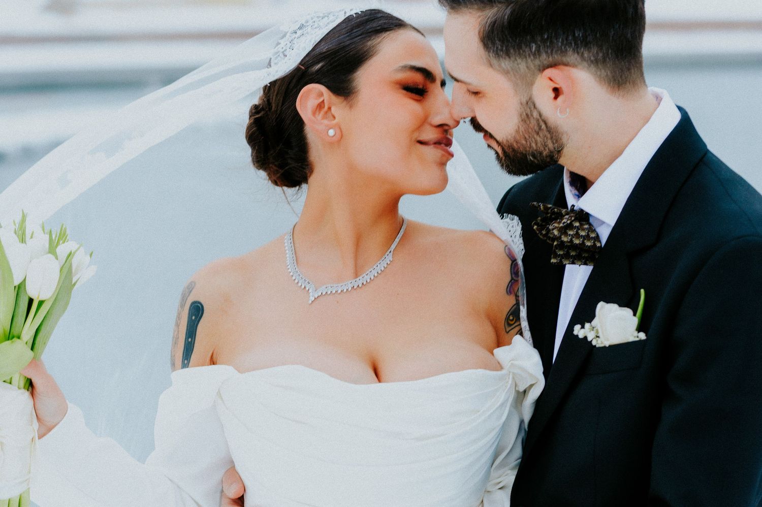 A romantic wedding couple shares intimate moments in a series of close-up photographs.