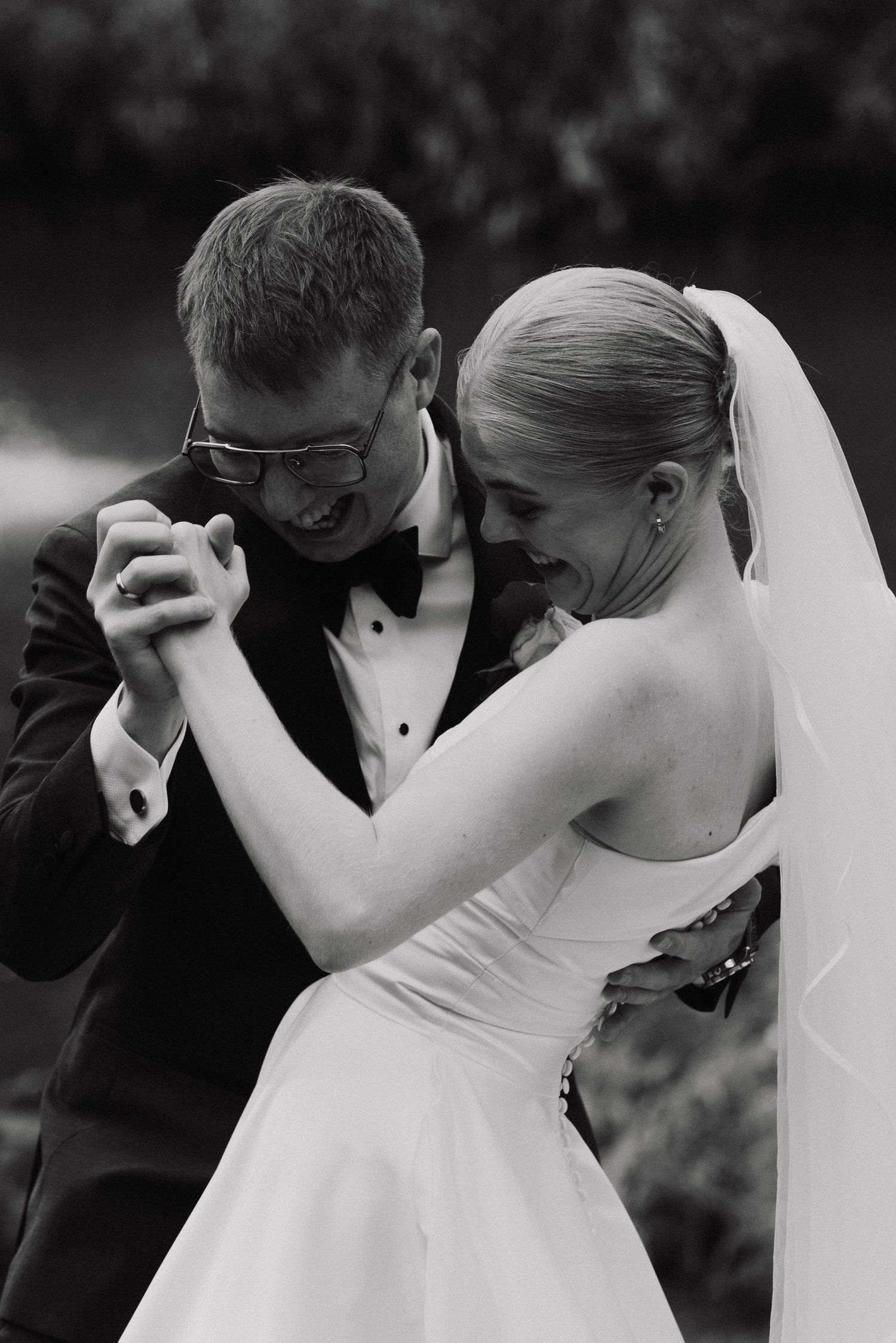 A series of black and white romantic wedding photos showing intimate moments between a couple during their special day.