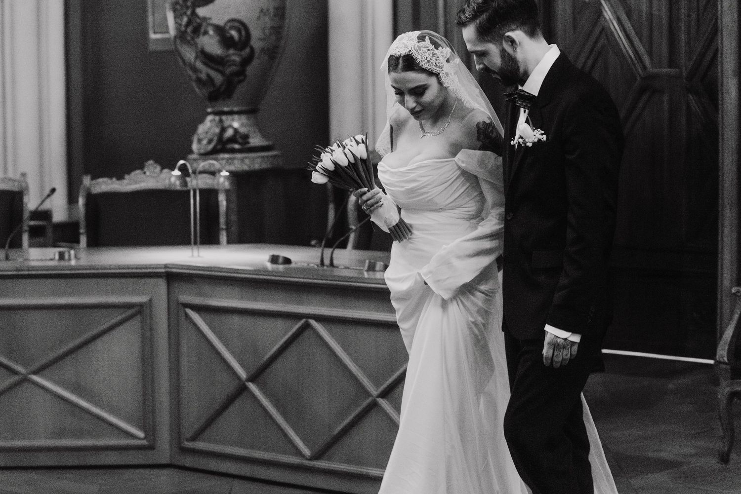 A collection of vintage black and white wedding photographs showing couples in traditional formal attire.