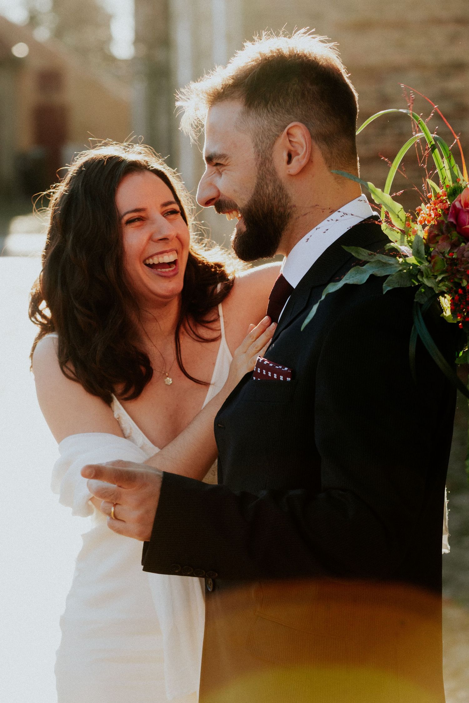 A romantic wedding sequence showing joyful moments between a couple in formal attire against a soft background.