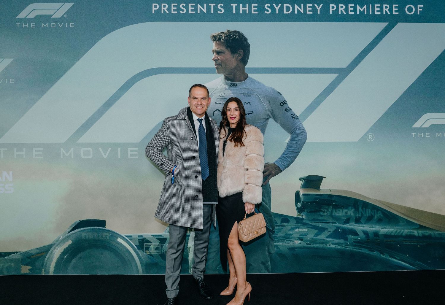 A movie premiere banner with multiple panels showing formal event attendees against a blue-tinted background.