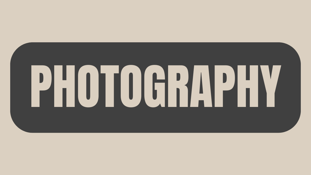 A black and white photography text banner with bold lettering against a light textured background.