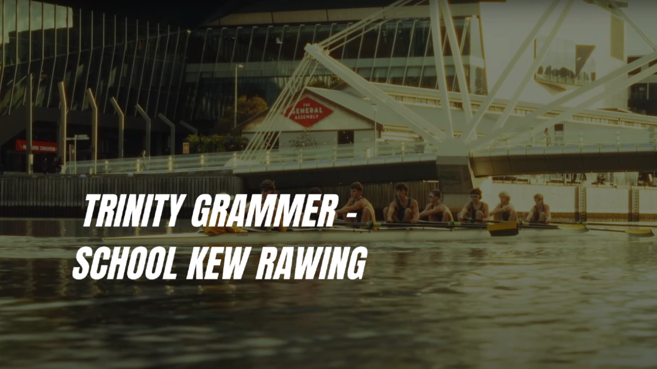 A series of rowing teams practicing on a river with boats and equipment visible in the background.