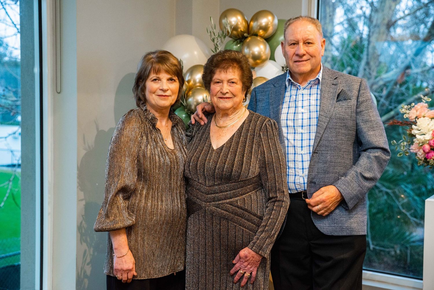 A series of four connected photos showing people posing together in formal attire at what appears to be a social gathering.