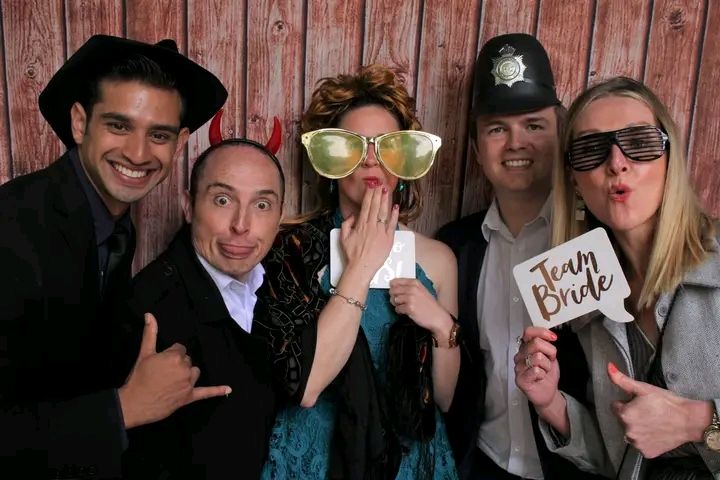 A collage of photo booth style party pictures showing people posing and having fun at a celebratory event.