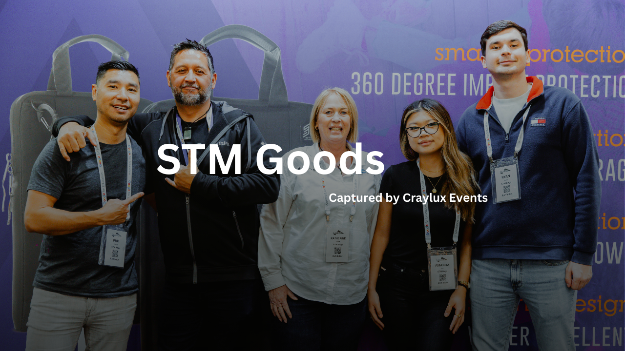 A group of people posing together at a tech event with a blue background showing '360 degree' text.