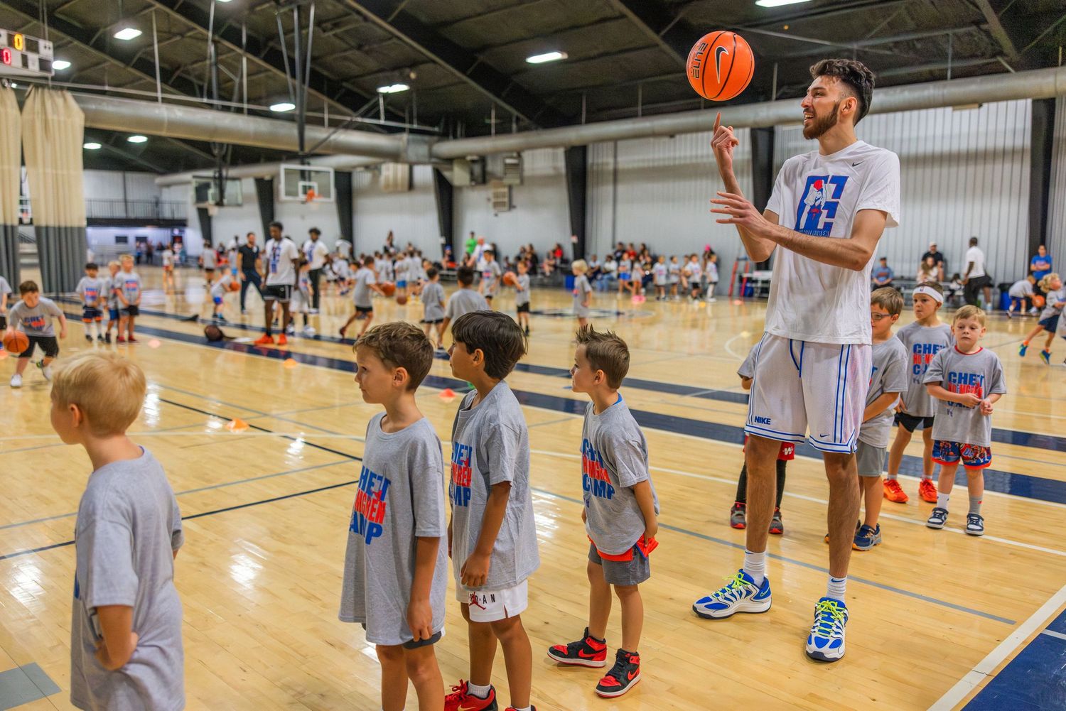 Chet Holmgren hangs out with youth campers at his ProCamp in Oklahoma City.