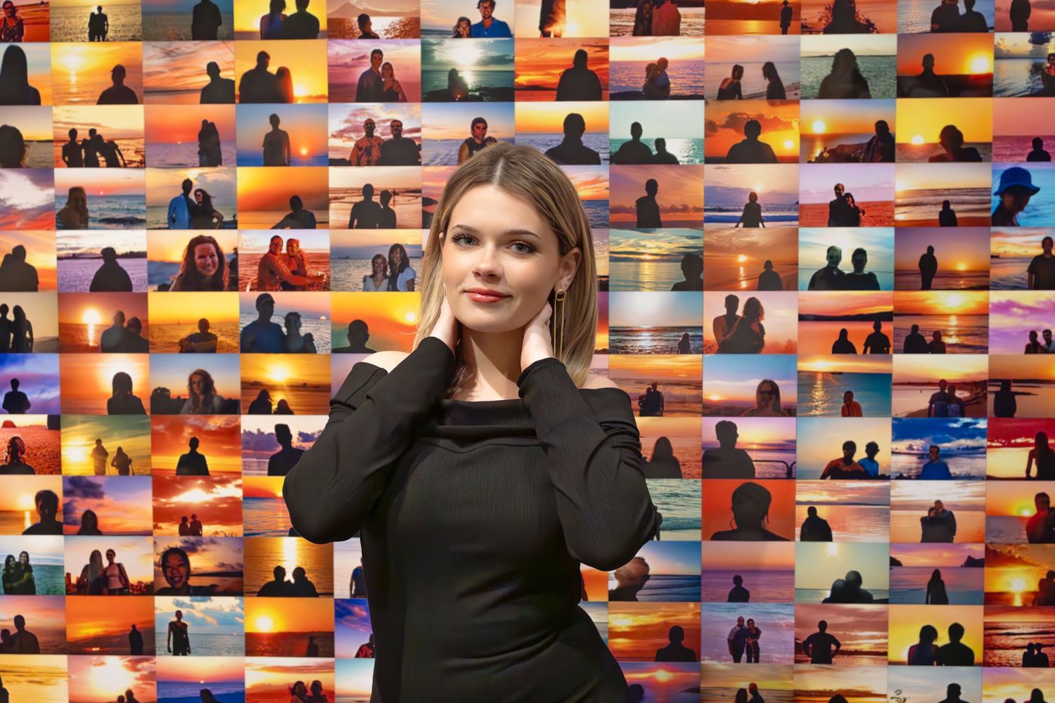 A model poses against a colorful wall display of illuminated shoe silhouettes in a retail setting.