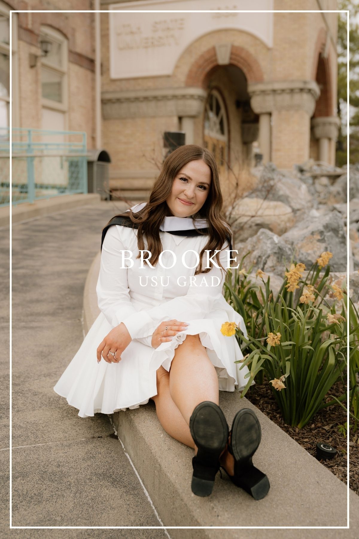 A portrait of someone in a short white dress and black boots sitting on stone steps near yellow daffodils.