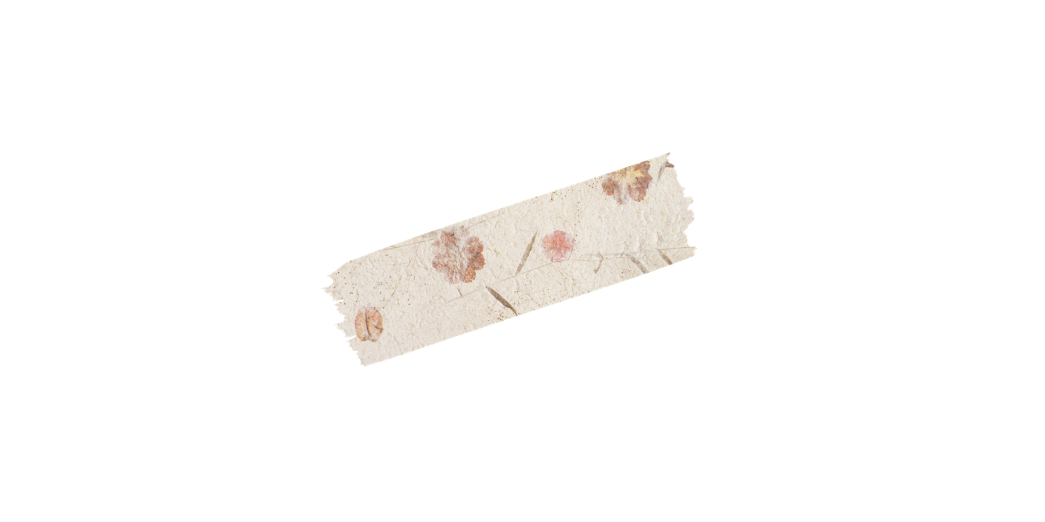 A used adhesive bandage with small heart patterns displays visible wear and dried medical tape.