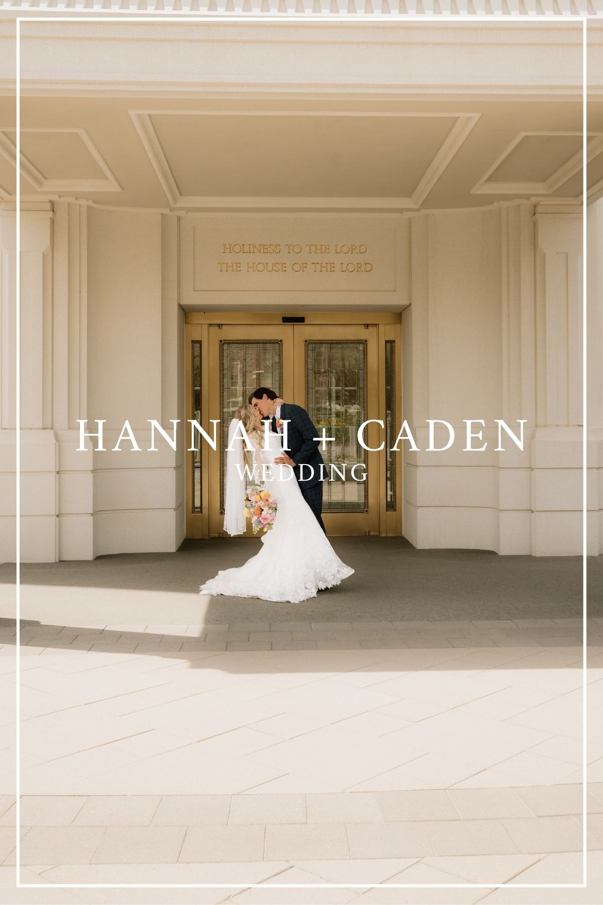 Wedding couple enters elegant building with white columns and ornate ceiling details through glass doors.