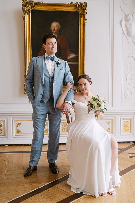 Classic seated-and-standing couple portrait in White Hall.