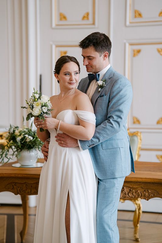 Back embrace portrait; elegant, close editorial moment.