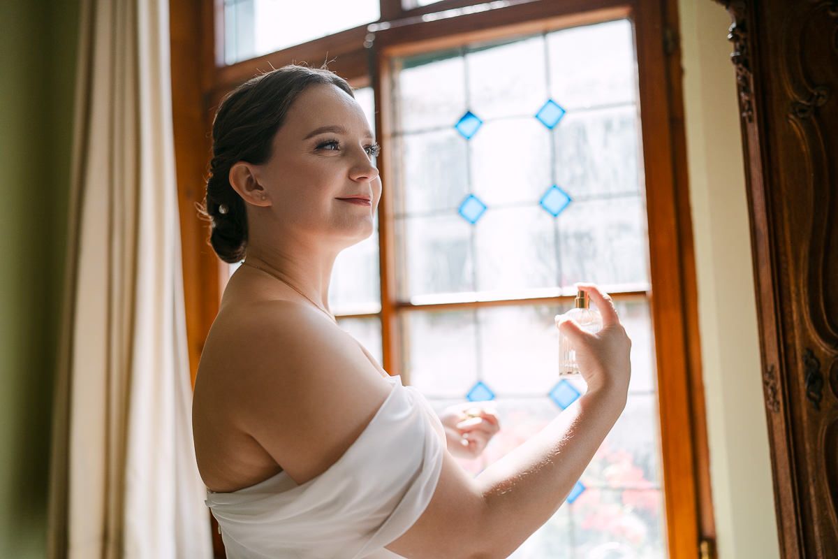 Calm bridal portrait by the window with natural light.