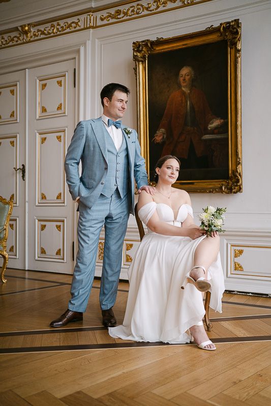 Classic seated-and-standing couple portrait in White Hall.