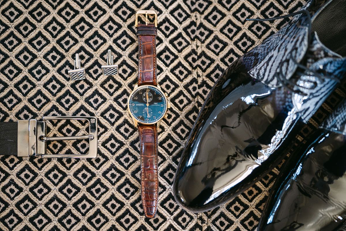 Groom details with watch, shoes and cufflinks at Manoir de Lébioles