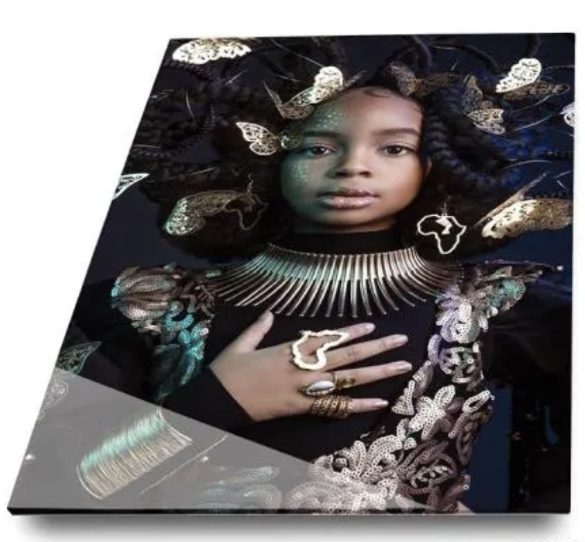 Artistic fashion photo collage featuring ethereal butterflies and metallic elements against a dark background.