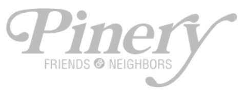 A grey text logo for Pinery Friends & Neighbors with a small circular dot design element between the words.