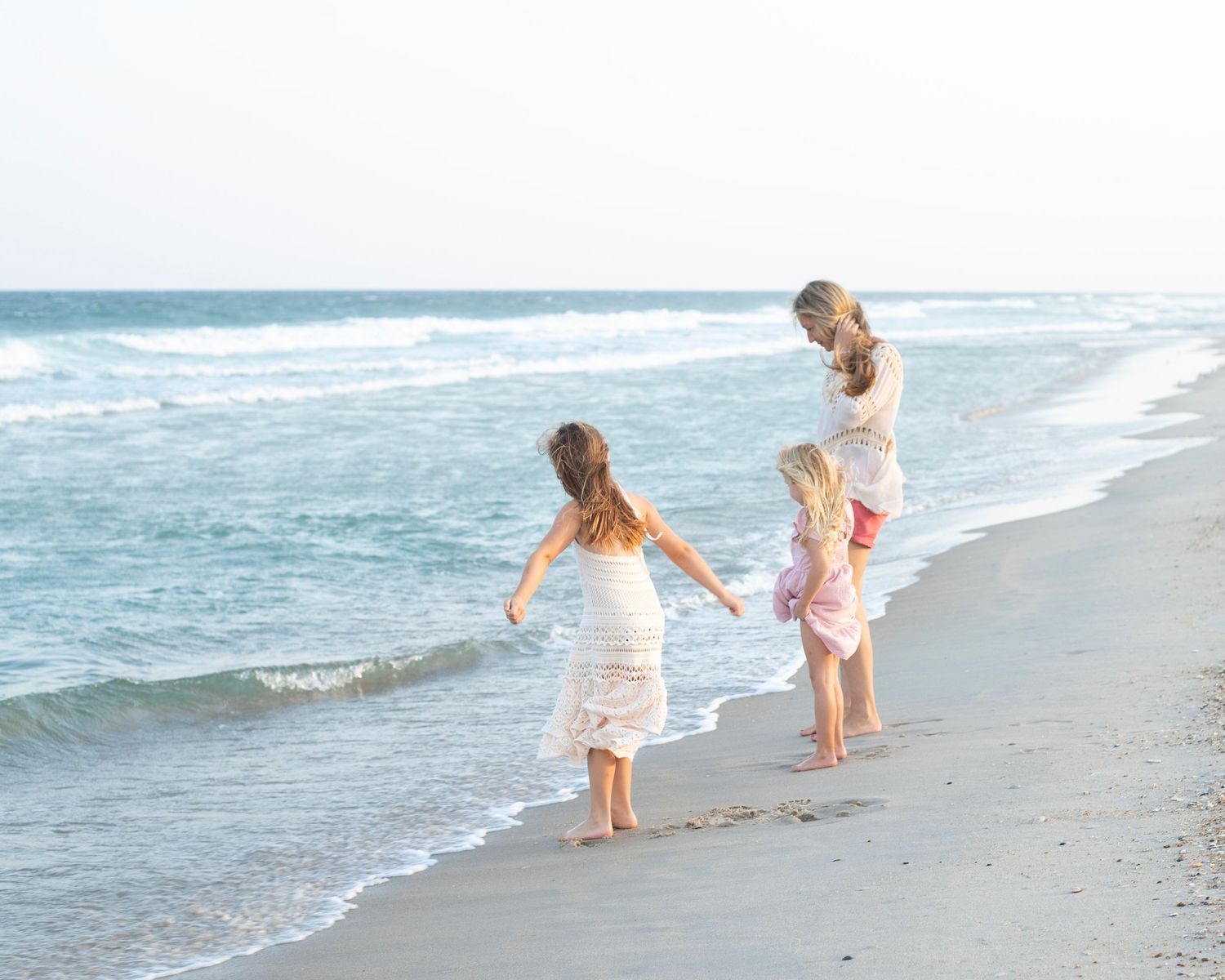 LBI candid family beach photos taken during a fun photo session nj family photographer