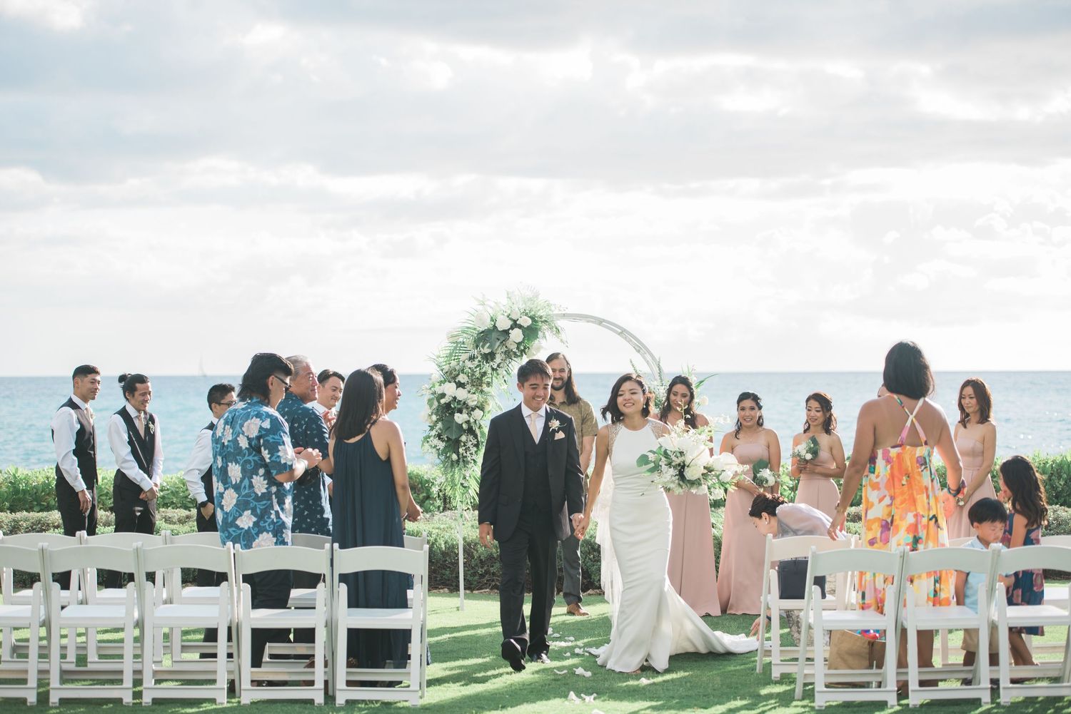 Outdoor wedding ceremony at Four Seasons Resort Oahu in Hawaii