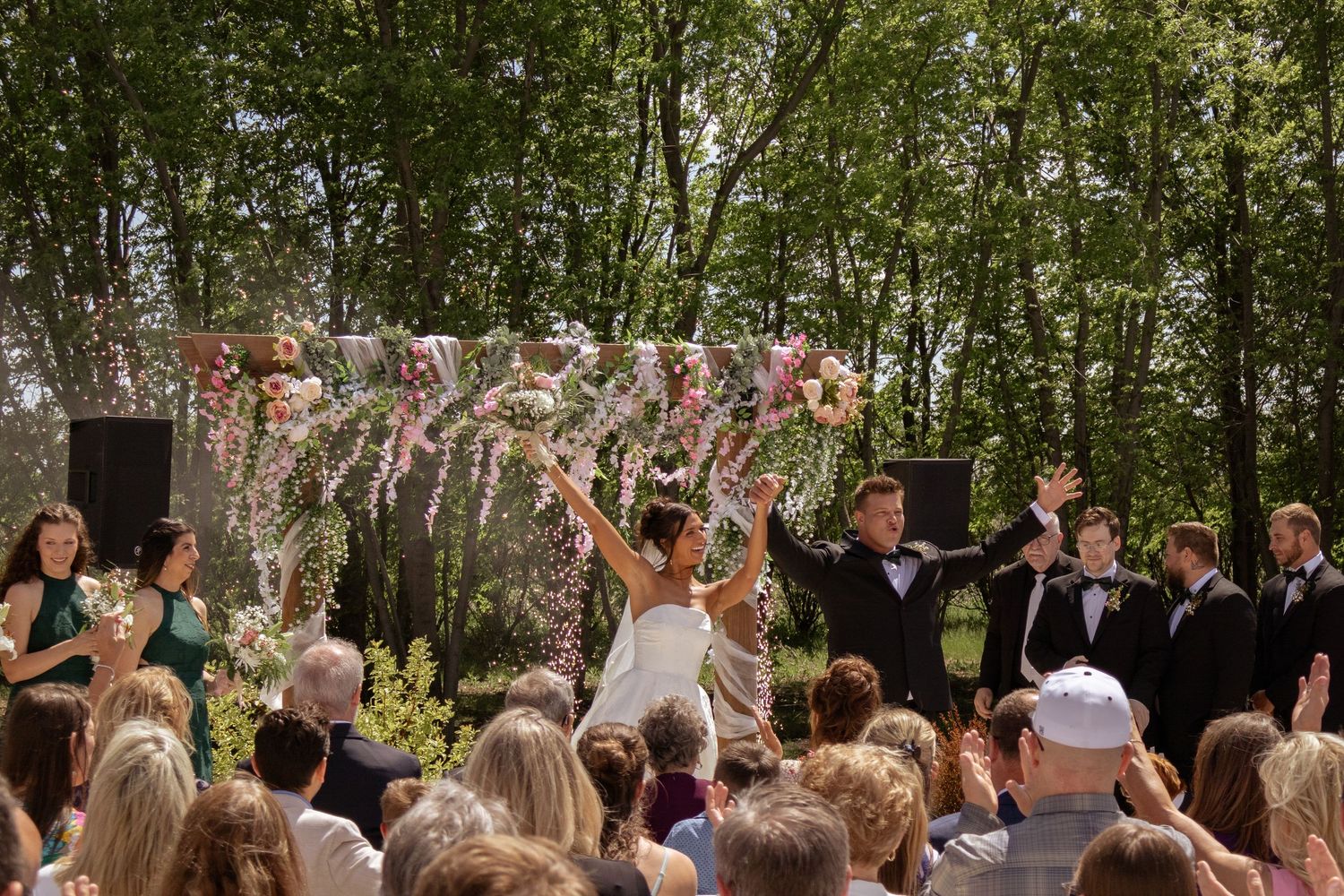 Wedding celebration, pink florals, outdoor ceremony, fireworks
