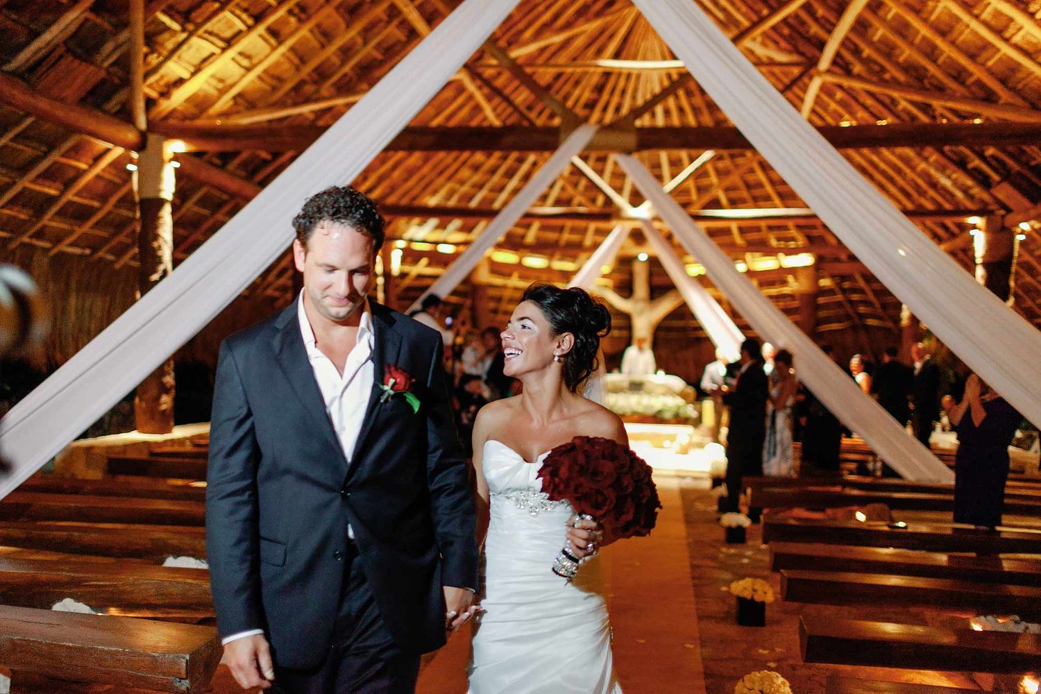 Bride and groom at San Francisco de Asís Chapel, Xcaret Riviera Maya—romantic Catholic wedding venue for destination weddings near Cancun
