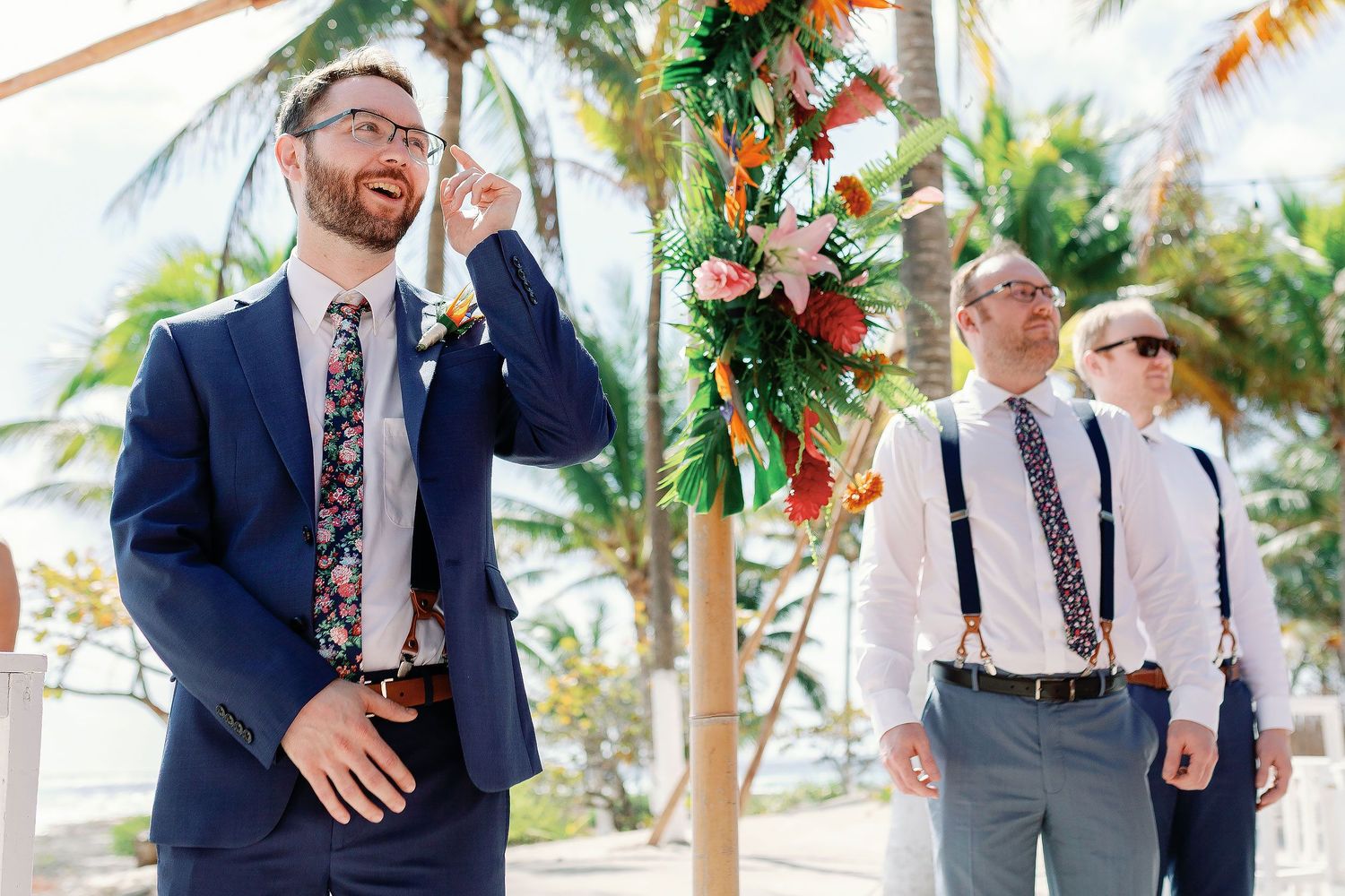 Thomas smiles as he sees Nicole approaching their beachfront wedding ceremony at Blue Venado in Playa del Carmen.