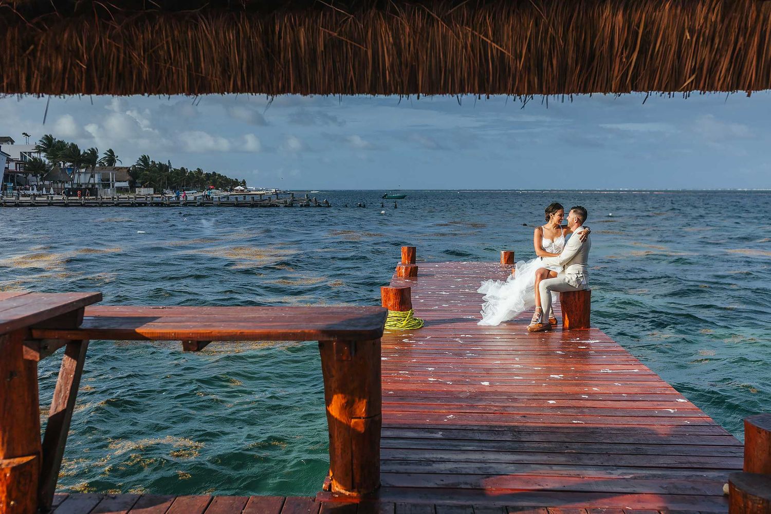 Romantic couples portrait by the marina in Puerto Morelos Cancun Mexico