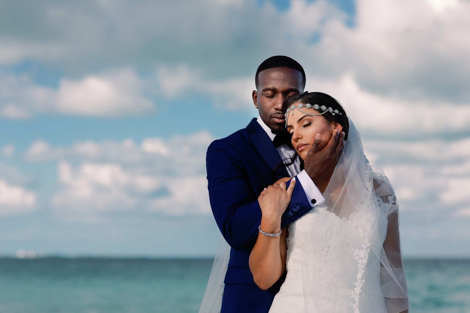 Intimate bride and groom beach portrait at Iberostar Cozumel captured by a Cozumel wedding photographer with soft Caribbean light.