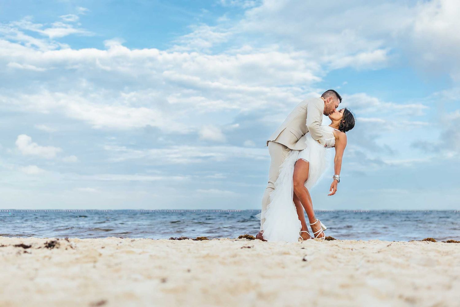 Romantic sunset engagement portrait on the beach in Puerto Morelos