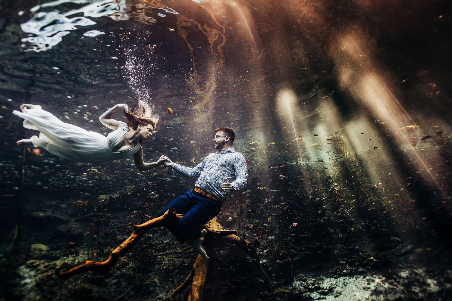 Creative underwater cenote portrait session in Tulum, Mexico by Luckie Photography.
