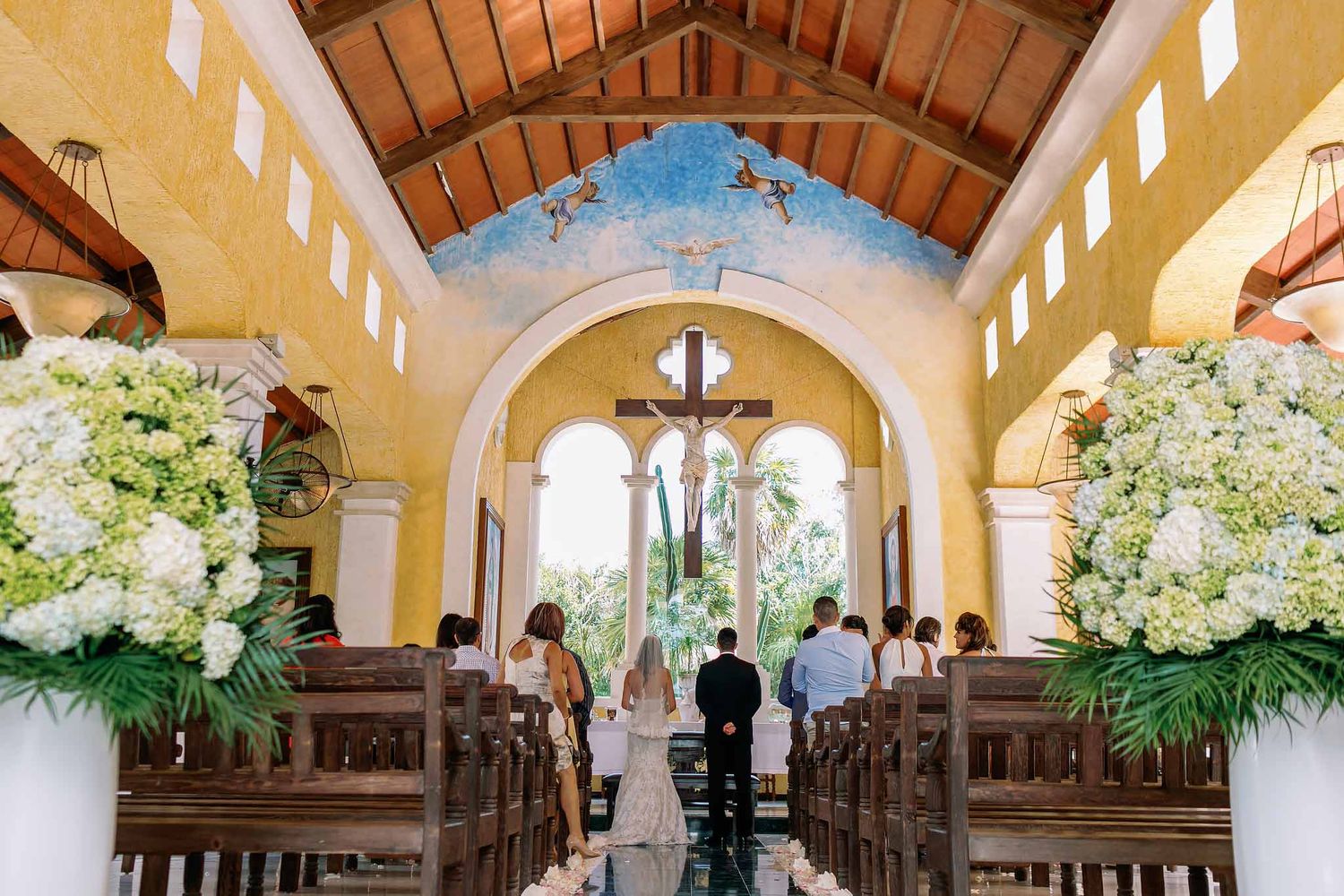 Catholic wedding at Our Lady of the Snows Chapel, Grand Palladium Riviera Maya—elegant church for destination weddings near Cancun