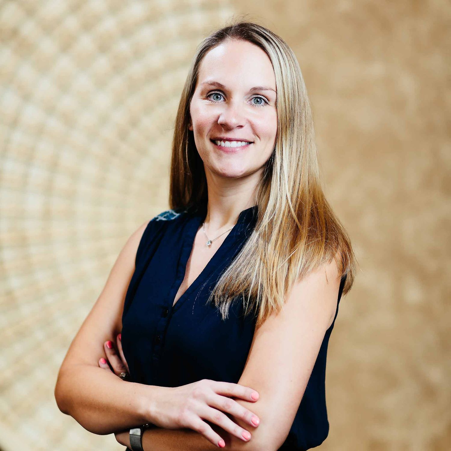 Professional corporate headshot photography Cancun with business portrait of woman smiling at camera