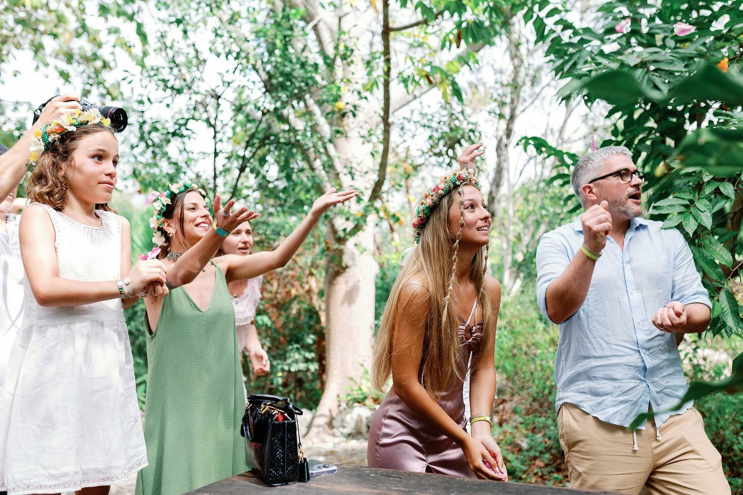 Family and friends celebrating after Jeff and Veronica’s intimate civil wedding ceremony at a cenote near Playa del Carmen.