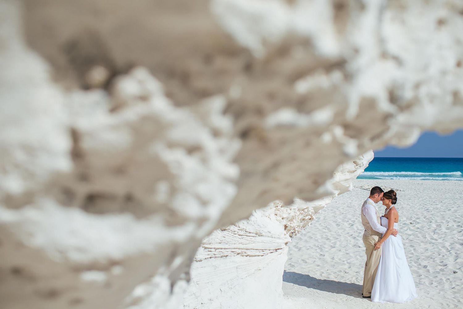 Artistic beach wedding photo at Hyatt Zilara Cancun. Professional destination wedding photography in Cancun Hotel Zone