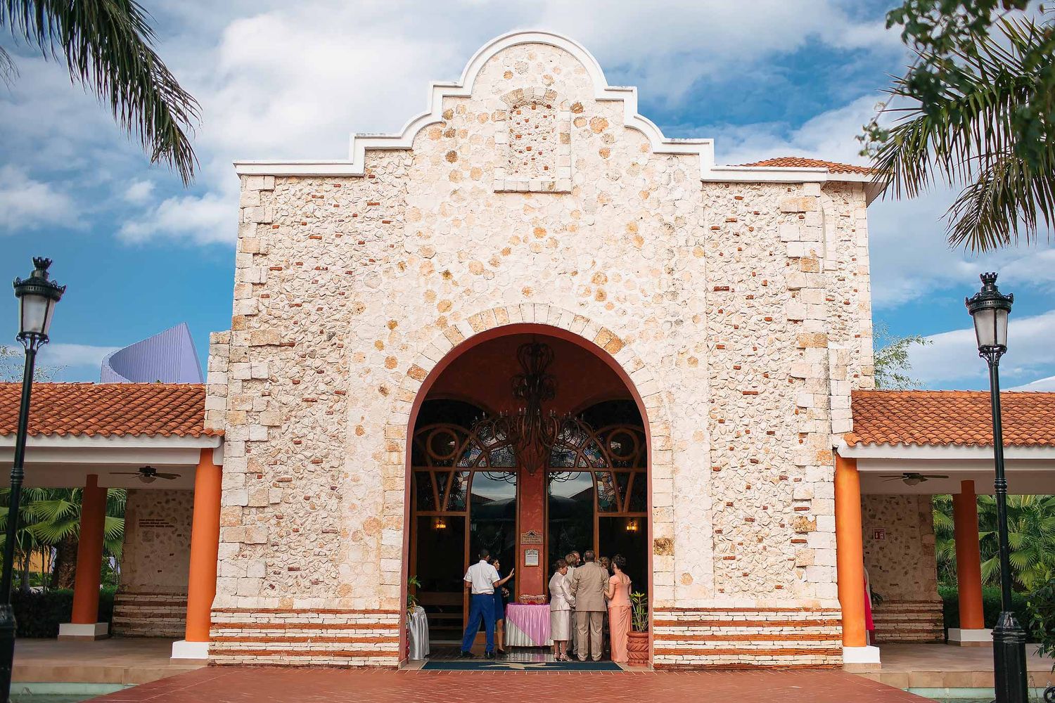 Exterior of Our Lady of Paradise Chapel at Iberostar Riviera Maya, beautiful Catholic wedding venue with stone facade