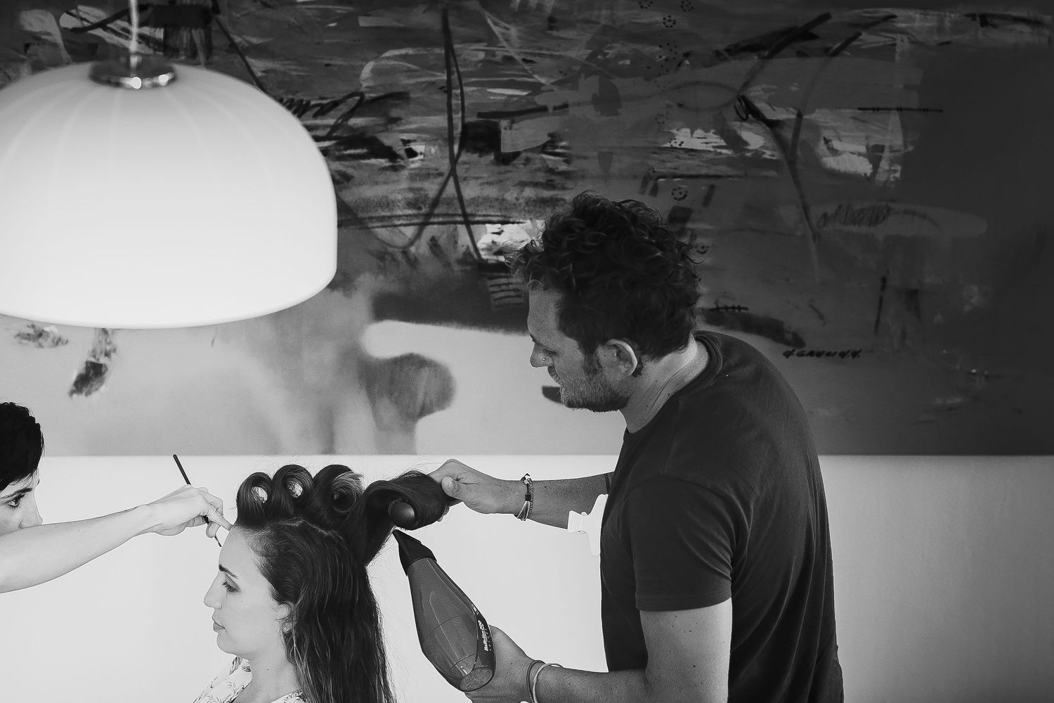 Juliana having her hair styled while getting ready at The Elements in Playa del Carmen.