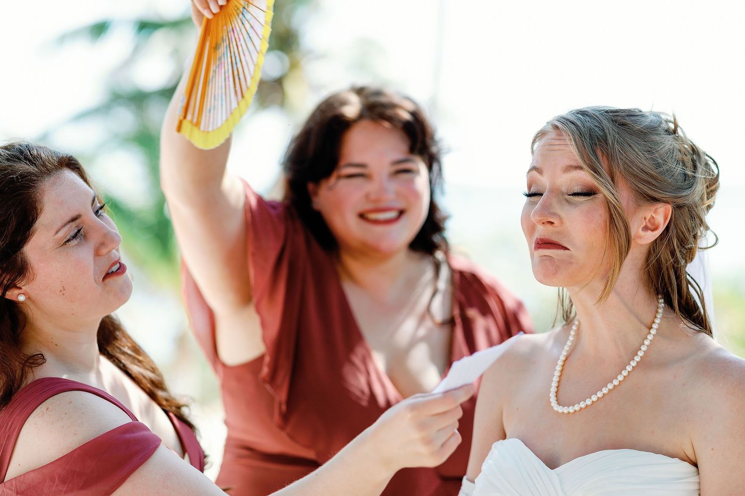 Nicole becomes emotional as her bridesmaids comfort her after sharing a first touch with Thomas before their Blue Venado wedding in Playa de